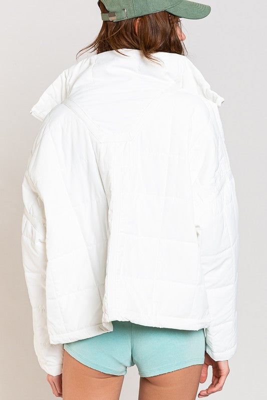 Designed in quilted jacket with zipper closure