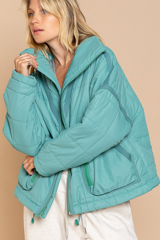 Designed in quilted jacket with zipper closure