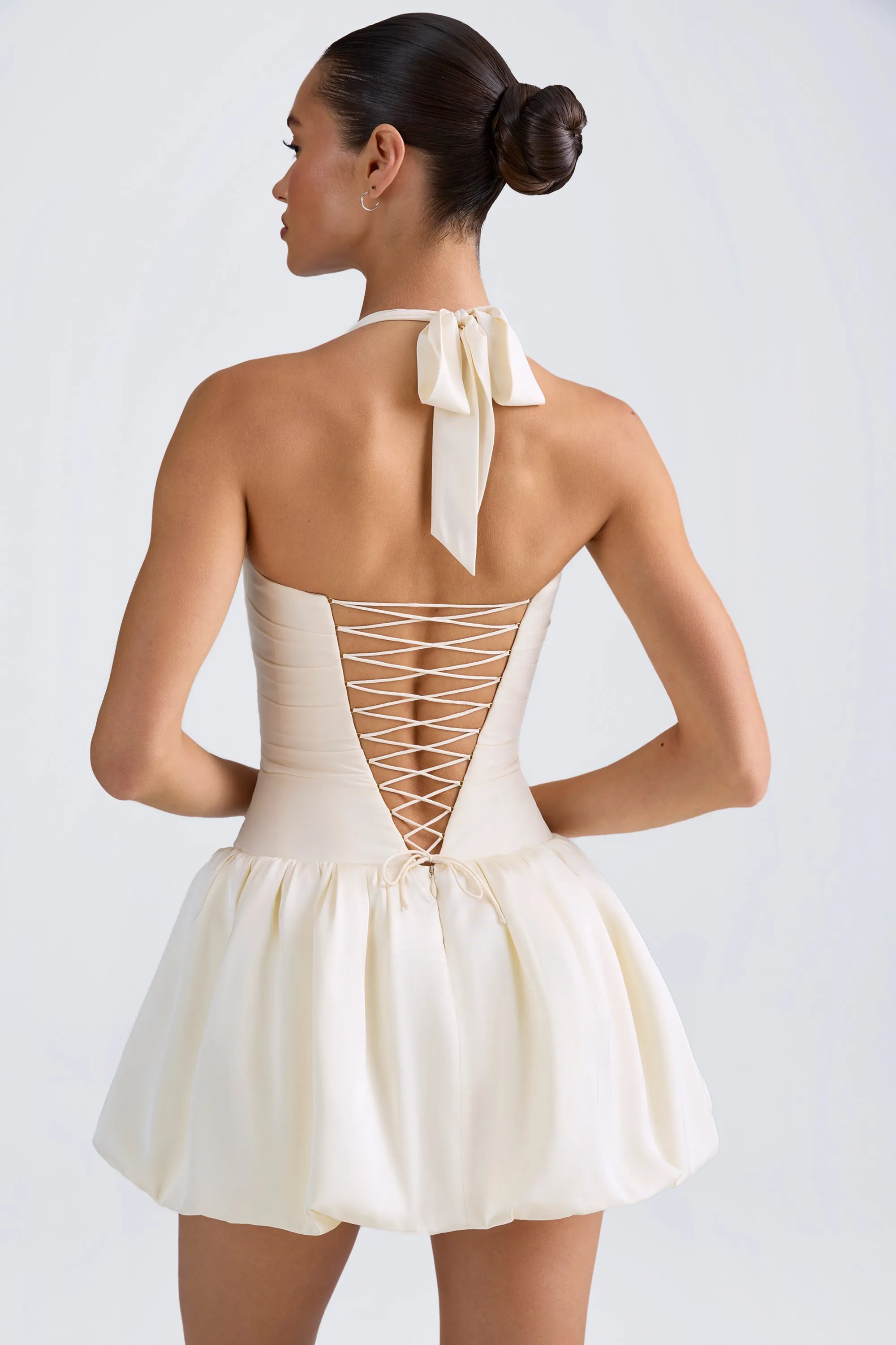 Halterneck Lace-Up Bubble Hem Corset Micro Mini Dress in Ivory